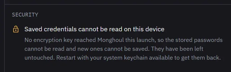 The same Security line with an open padlock, reading "Saved credentials cannot be read on this device", and below it that no encryption key reached Monghoul, that stored passwords have been left untouched, and to restart with the system keychain available